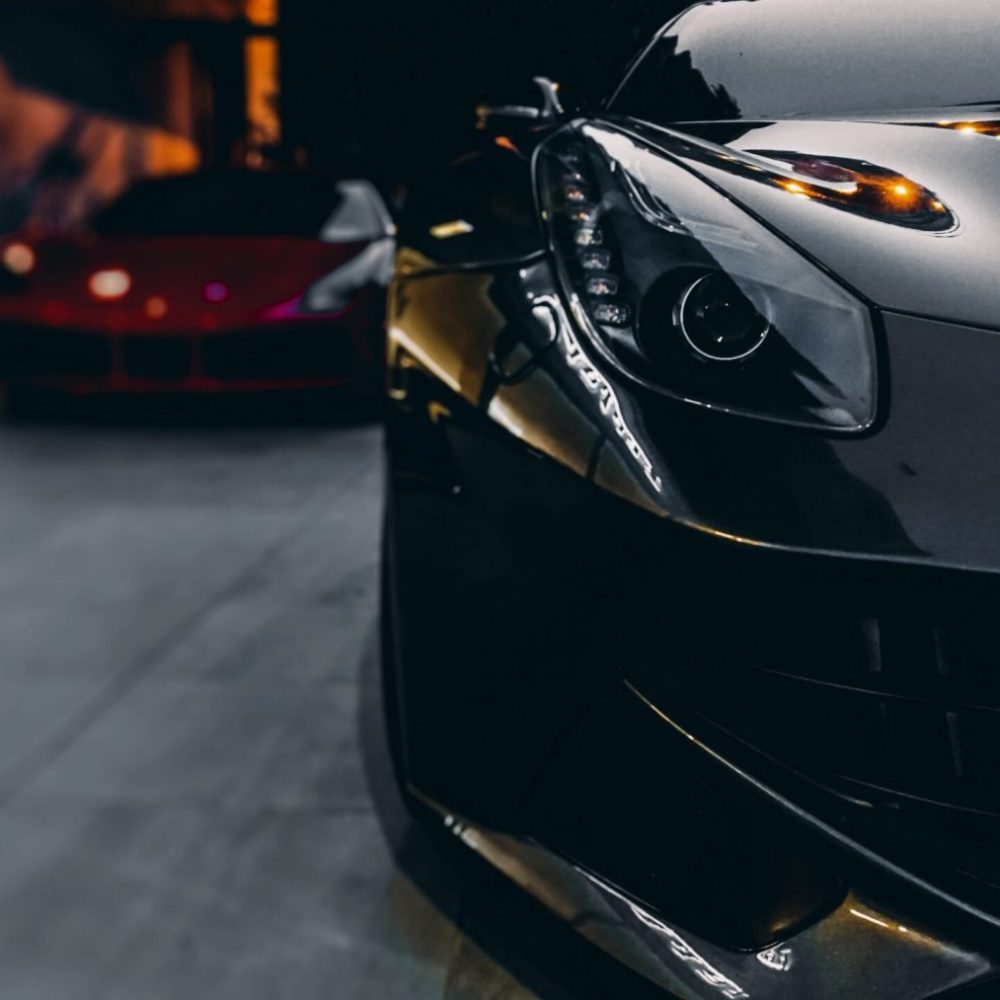 Front of a sports car - black and red car